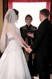 Shelley Dugan officiating at wedding. Beloved Life