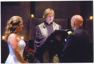 Shelley Dugan officiating a wedding, Beloved Life